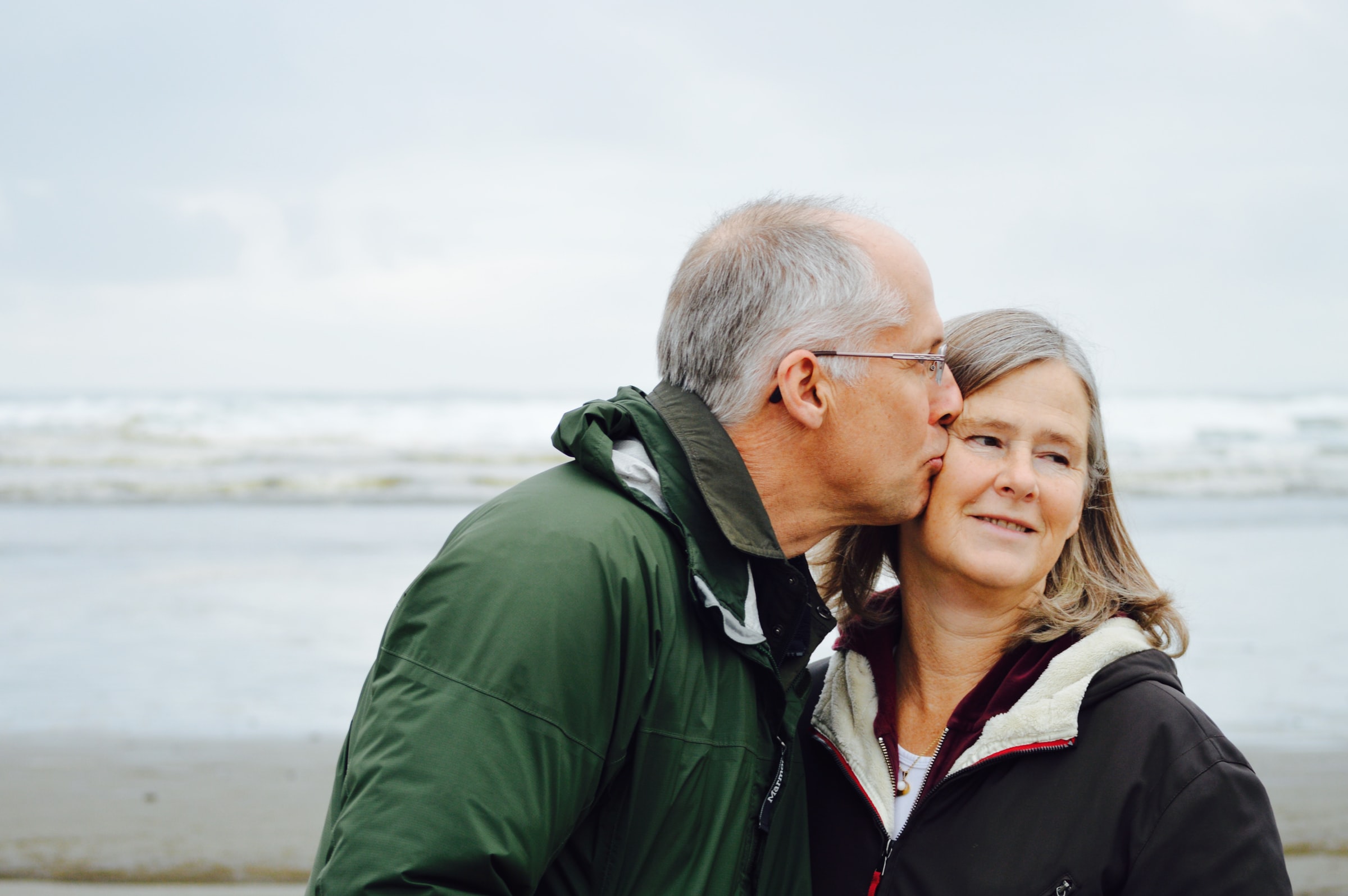 Elder man kissing wife - Healthier Me Today