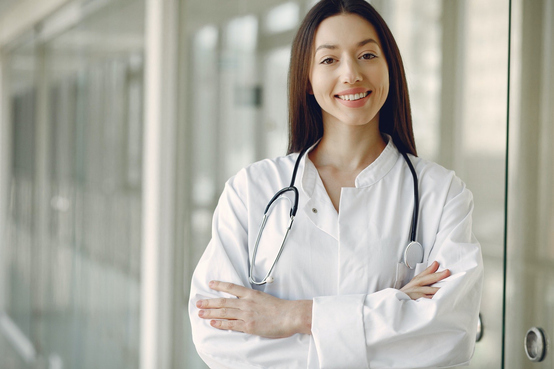 Doctor smiling at camera | Healthier Me Today