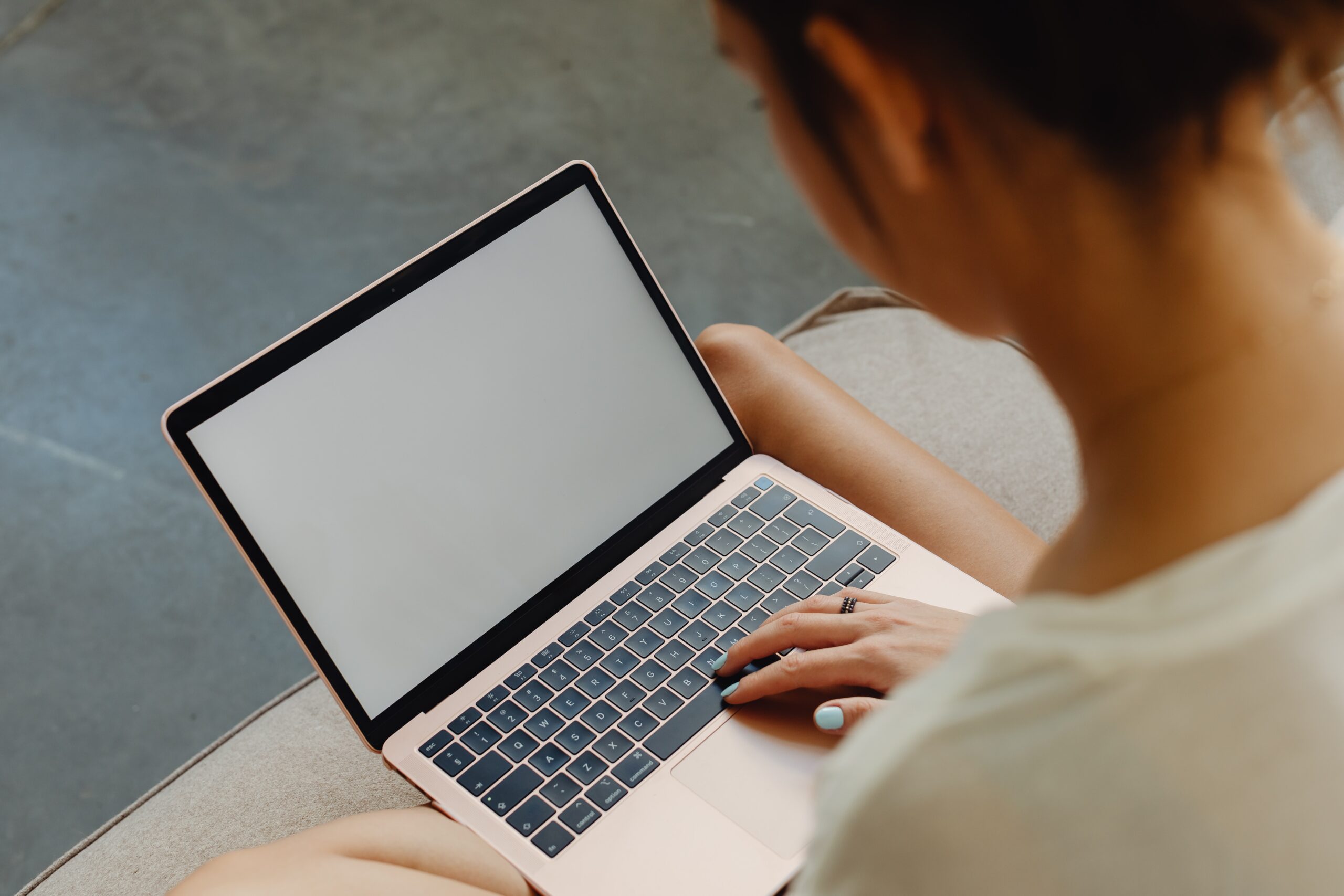 Woman working on laptop | Healthier Me Today