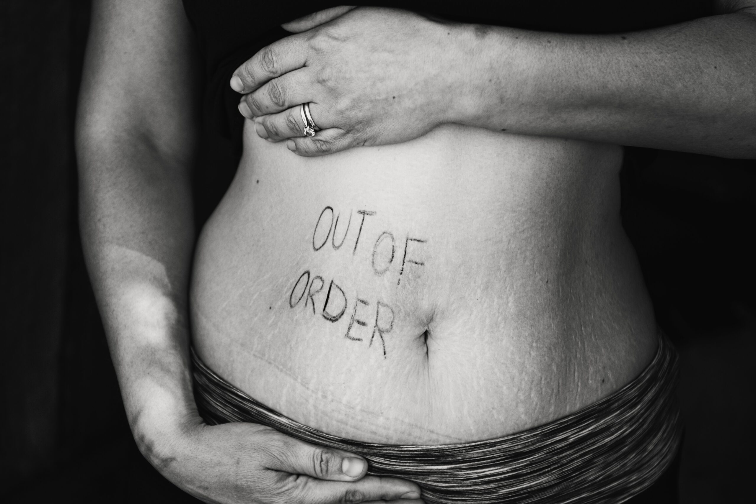 Woman with writing on bare stomach | Healthier Me Today