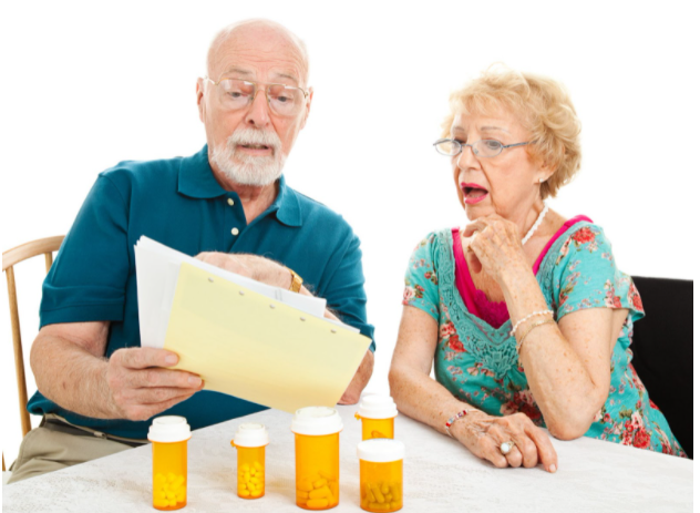 Does Medicare Cover the Flu Shot - Elder reading | Healthier Me Today