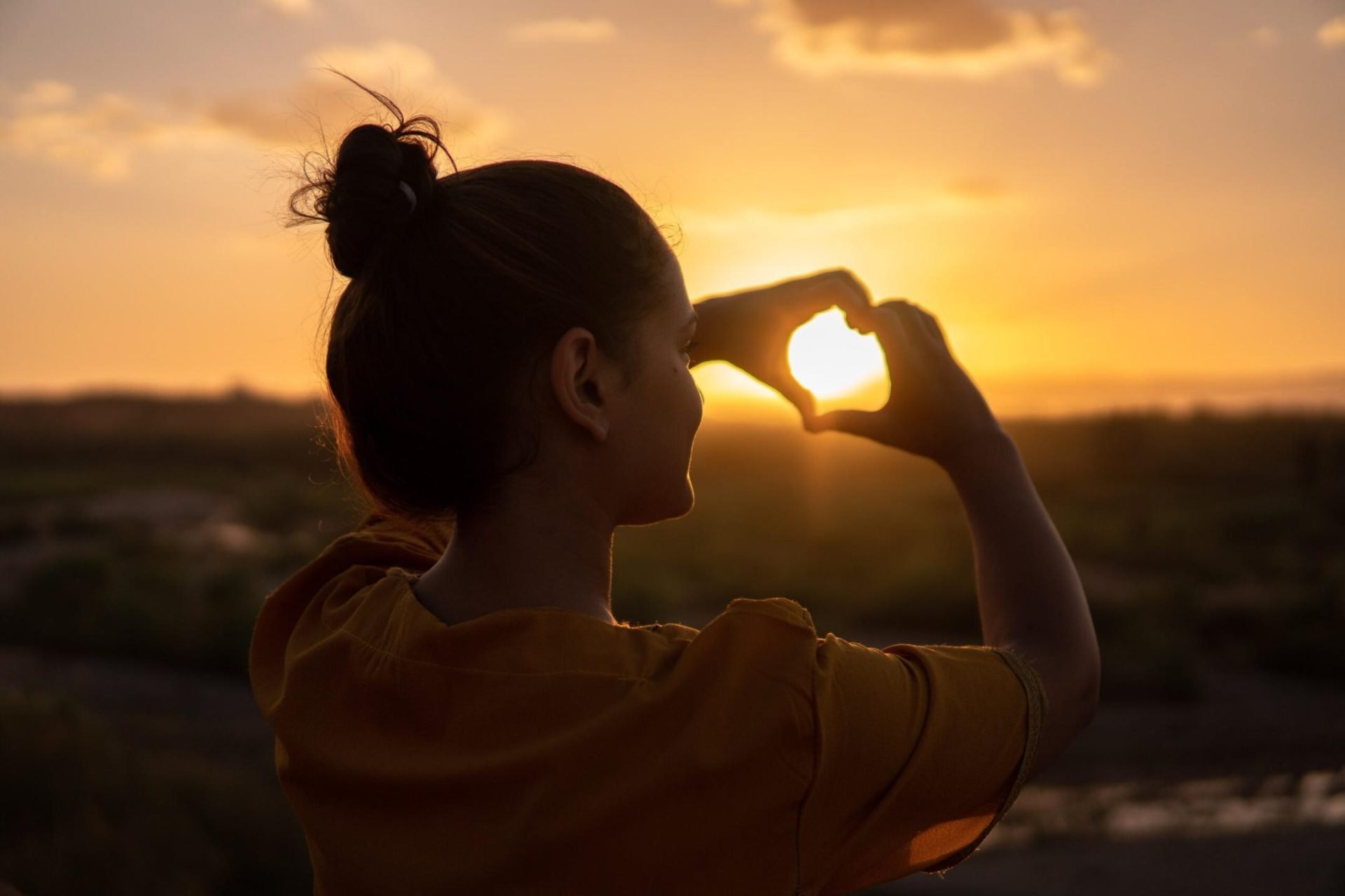 Romanticize Yourself this Valentine's Day - Woman showing heart | Healthier Me Today