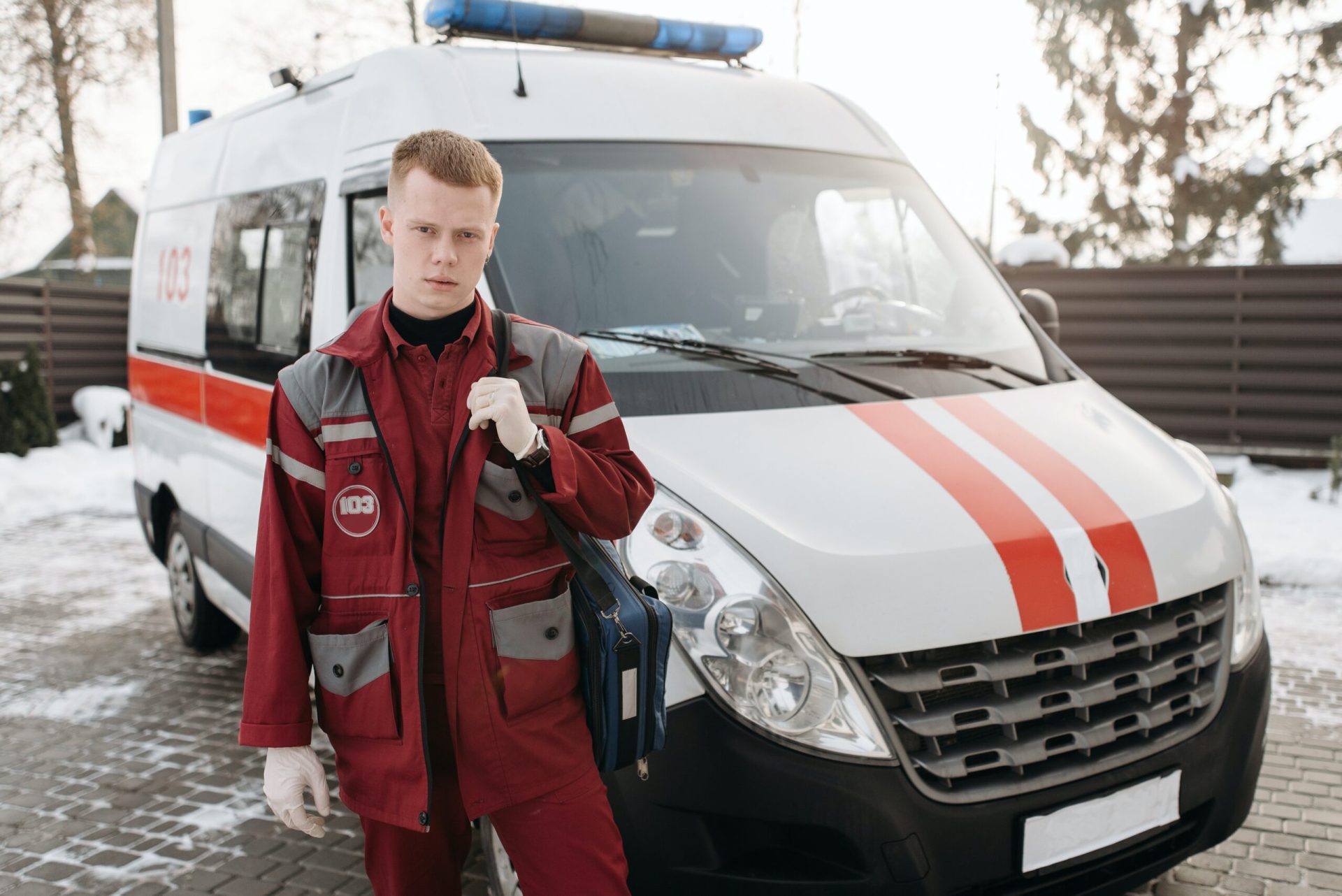 Does medicare cover ambulance - man infront of ambulance | Healthier Me Today