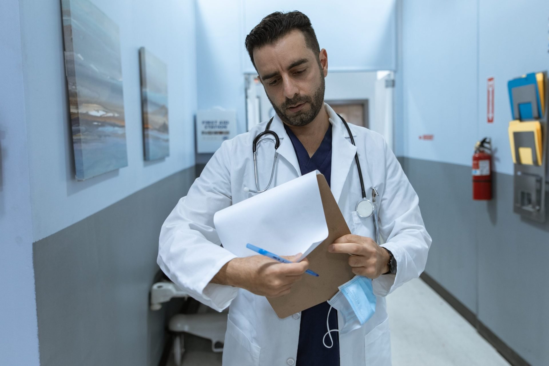 Medicare Part B Special Enrollment - Doctor looking at pad | Healthier Me Today