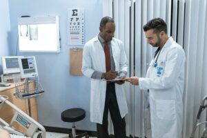 Does Medicare Cover the Flu Shot - doctor at the office | Healthier Me Today