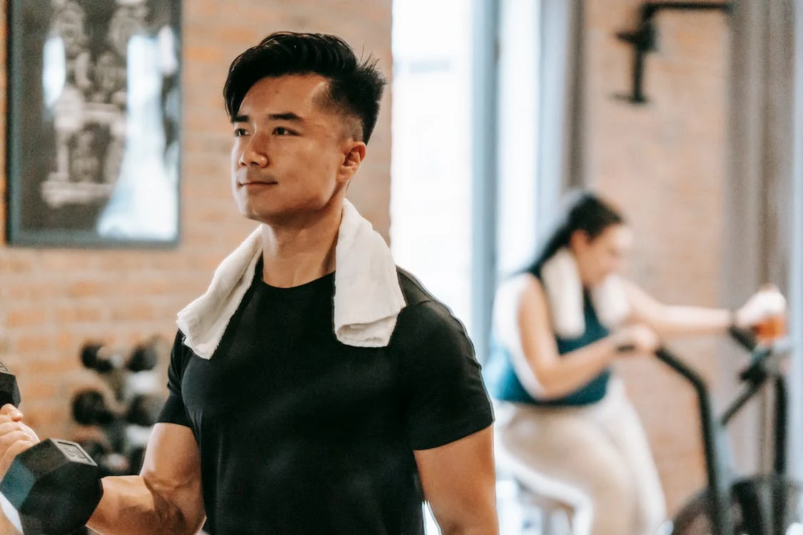 A Man and a Woman Training at the Gym, Man feeling relieved // Healthier Me Today