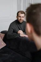 Man in Black Crew Neck T-shirt Sitting on Black Sofa // Healthier Me Today