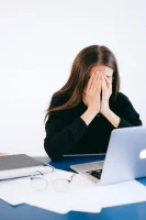 Stressed Woman Covering her Face with her Hands // Healthier Me Today