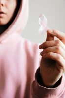 Woman Holding Pink Ribbon // Healthier Me Today