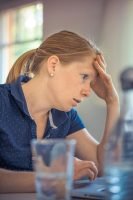 Woman Sitting in Front of the Laptop Computer in Shallow Photo // Healthier Me Today